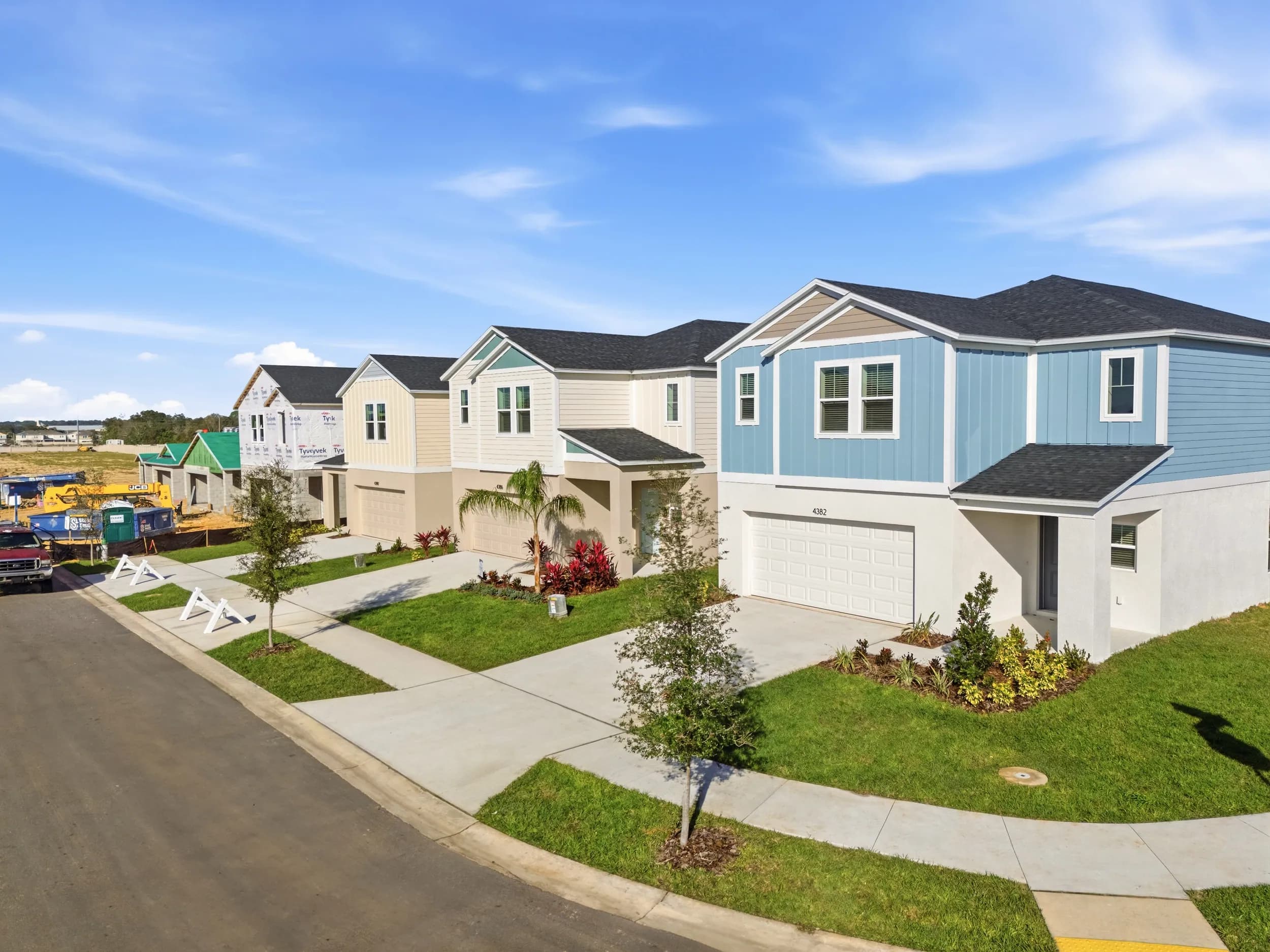 Row of new Crosswinds homes with blue and cream siding