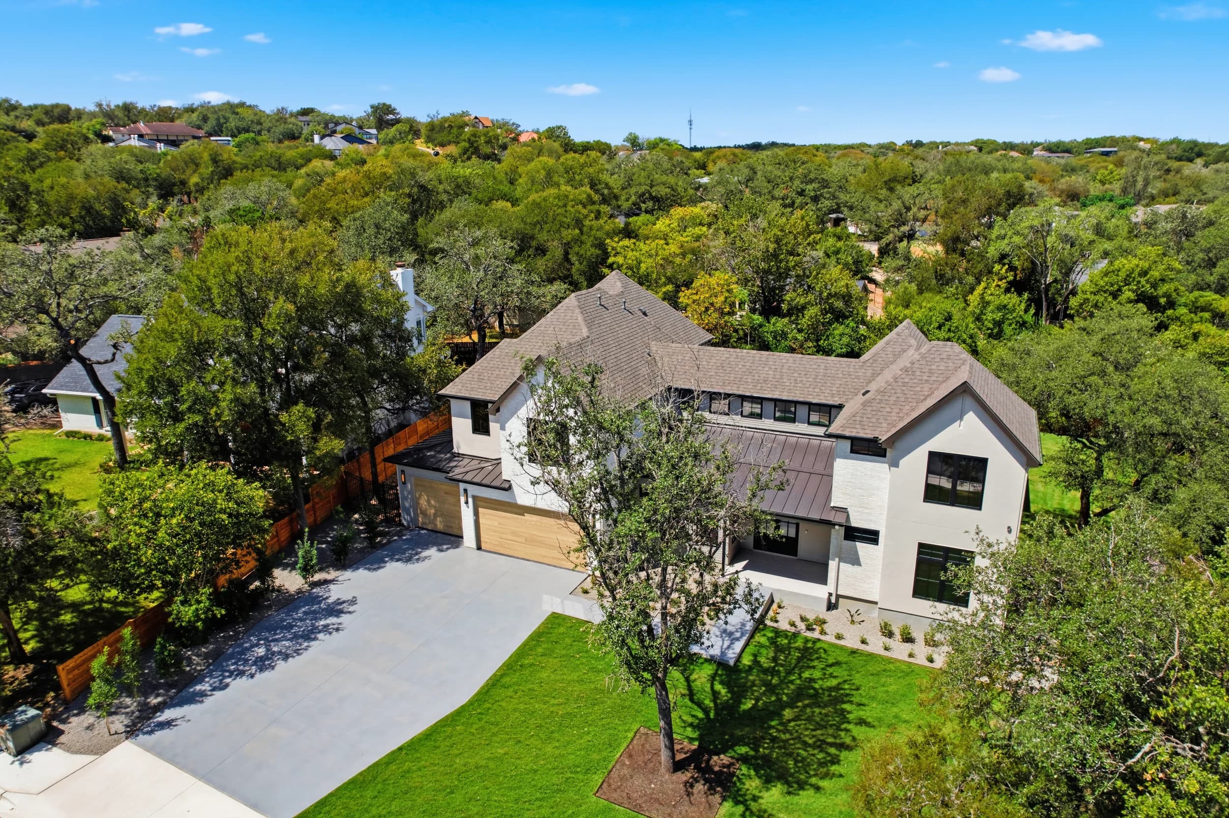 Paradisa Homes: drone exterior westlake, Austin, Texas