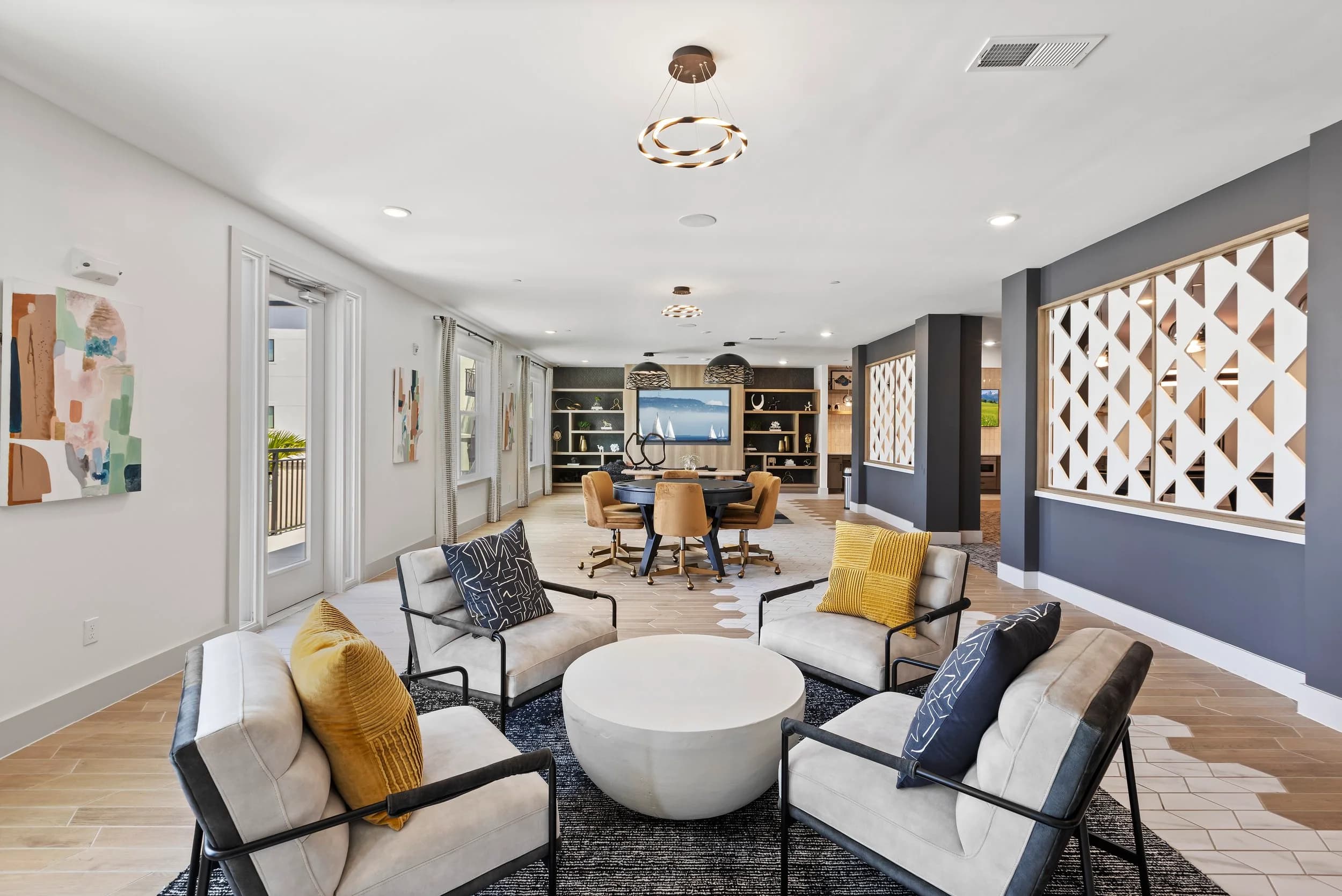 Clubhouse co-working lounge with feature ceiling light