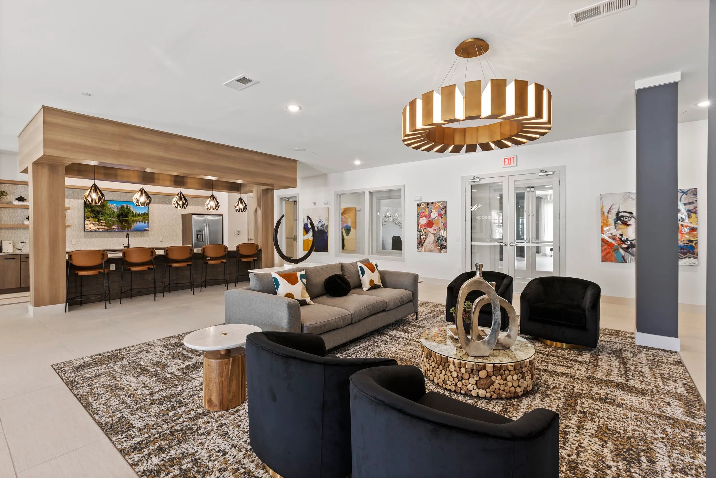 Clubhouse bar and lounge with sculptural chandelier