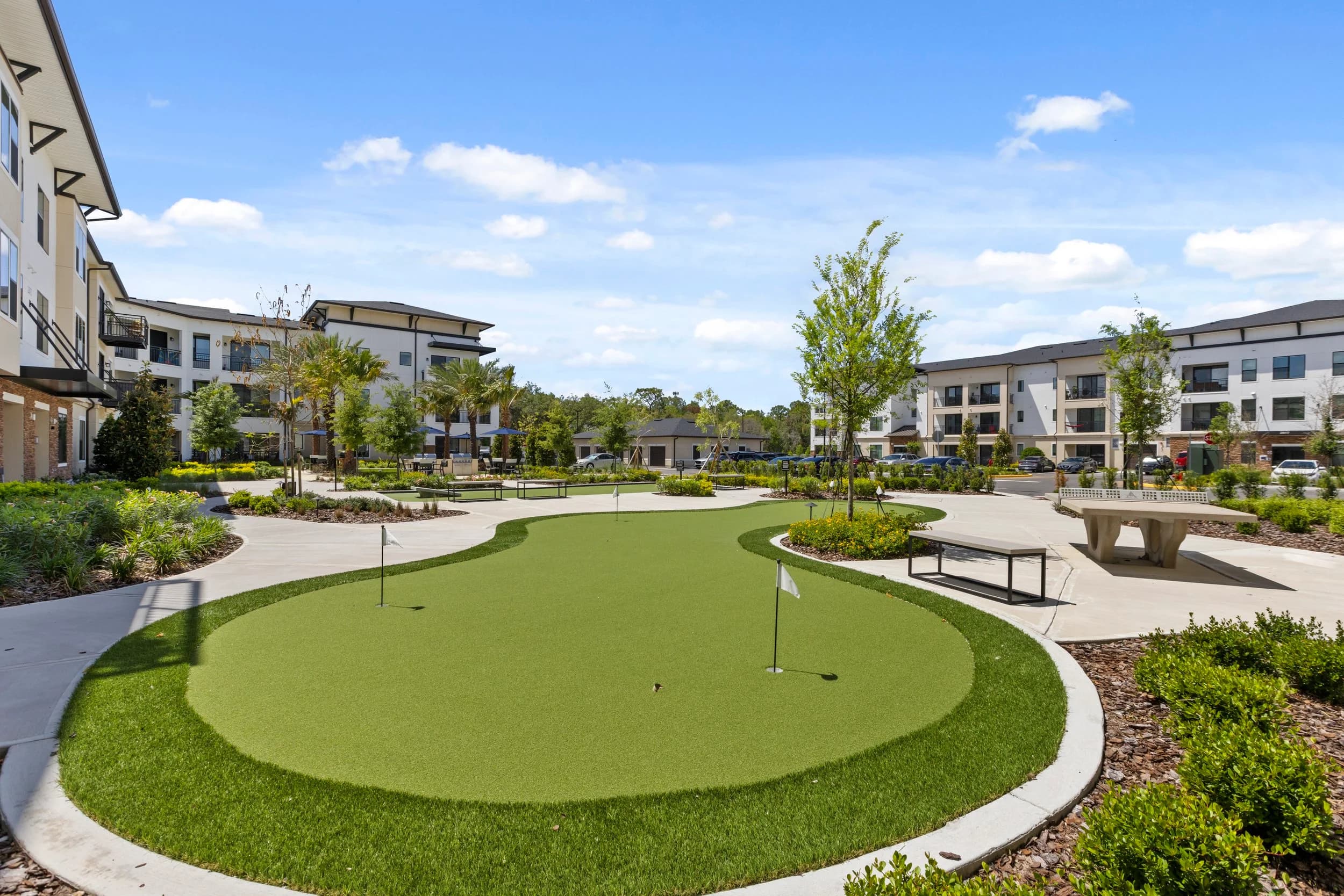 Putting green in an apartment community courtyard
