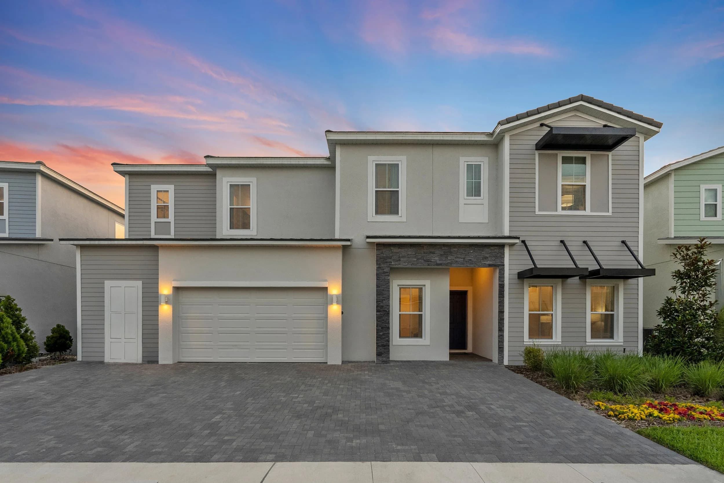 Vacation rental home exterior at twilight