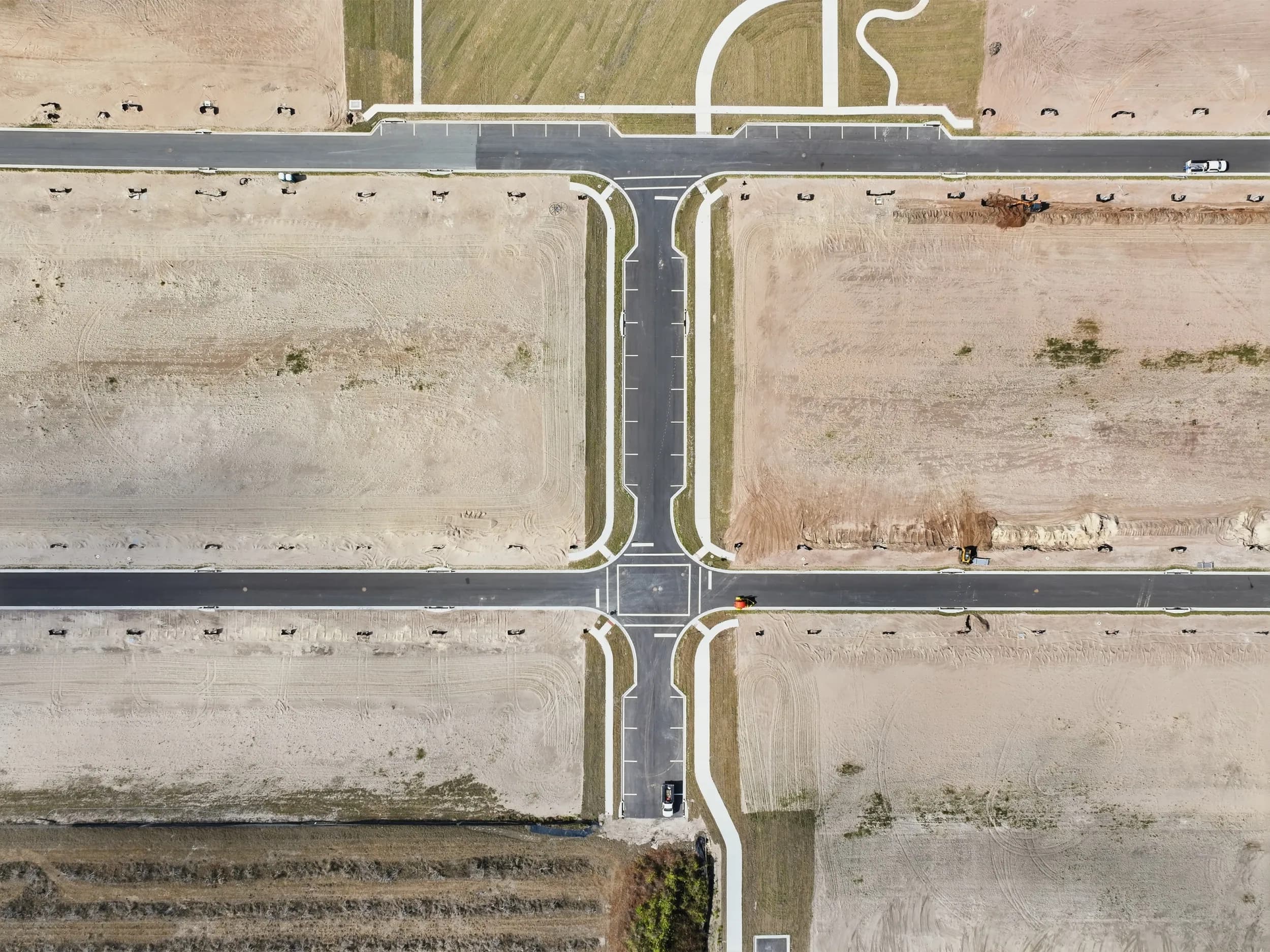 Top-down of new streets and curbs before the homes