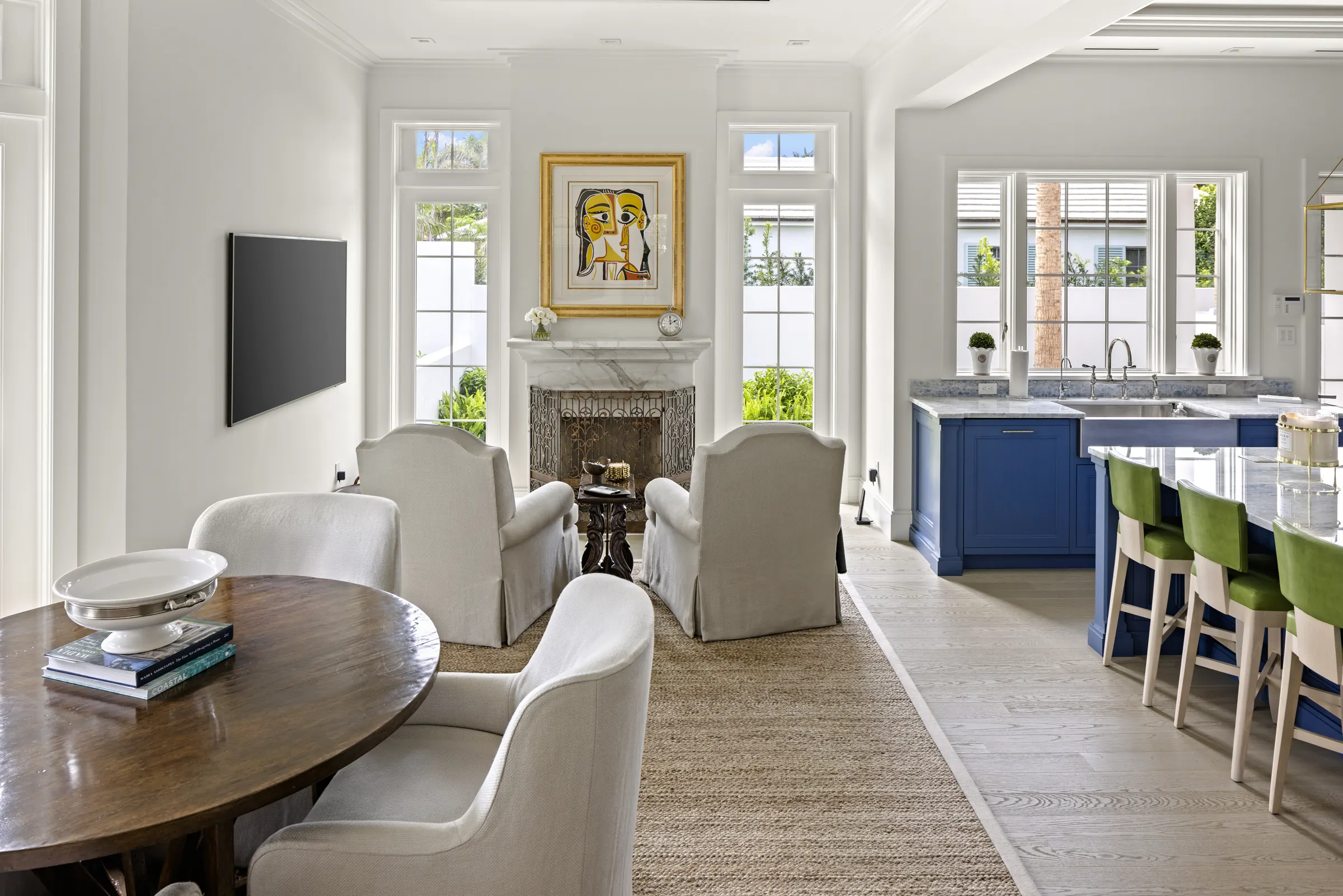 Dining area by the fireplace, open to the kitchen