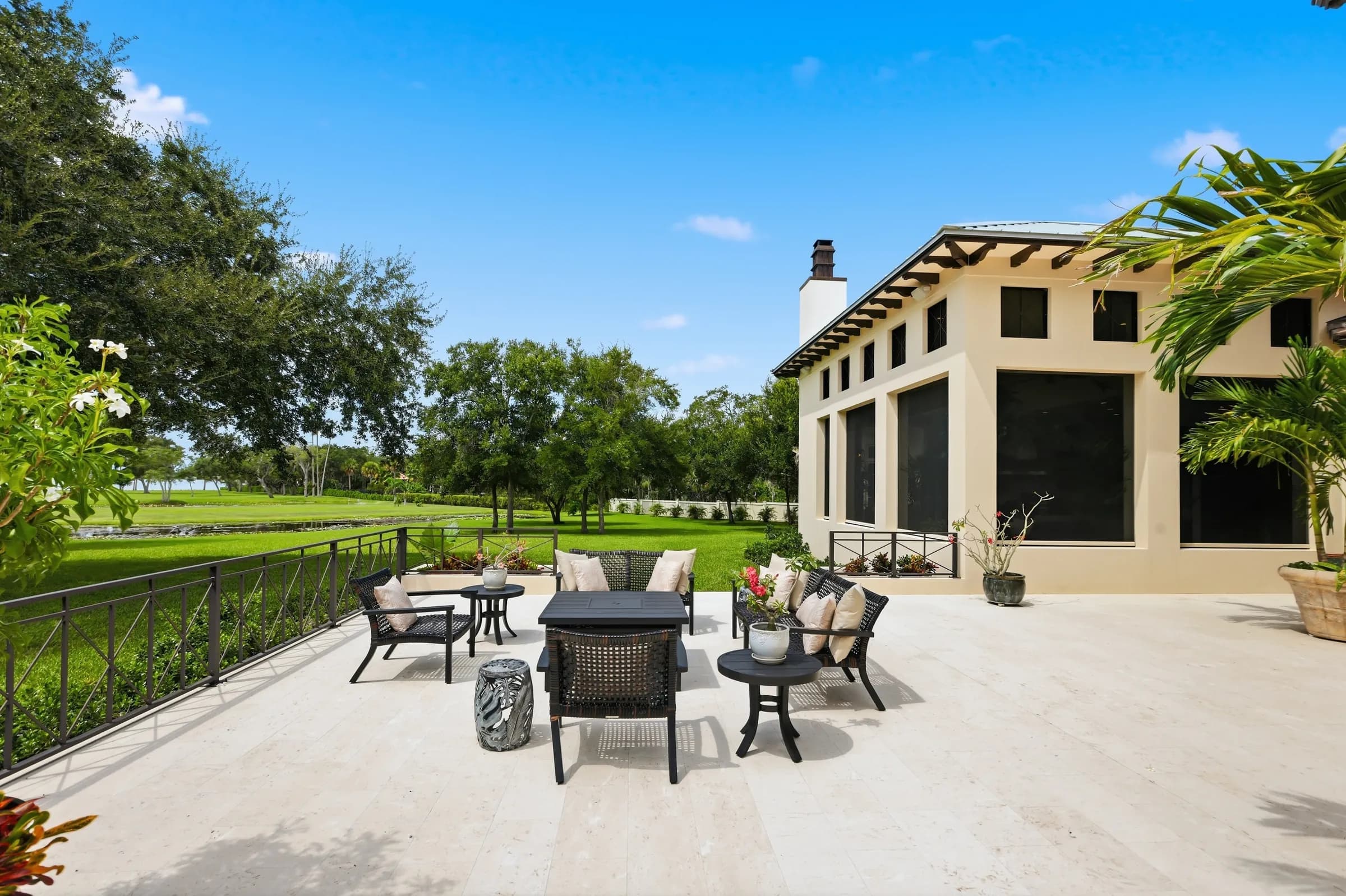 Terrace seating looking across the lawn to the oaks